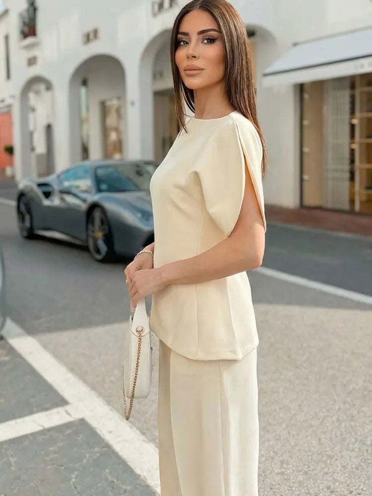 Elegant Asymmetrical Hem Solid Puff Sleeve Blouse