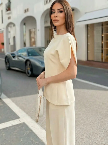 Elegant Asymmetrical Hem Solid Puff Sleeve Blouse